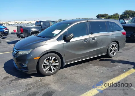 2018 Honda Odyssey Elite z USA, uszkodzony, nr VIN 5FNRL6H90JB097224